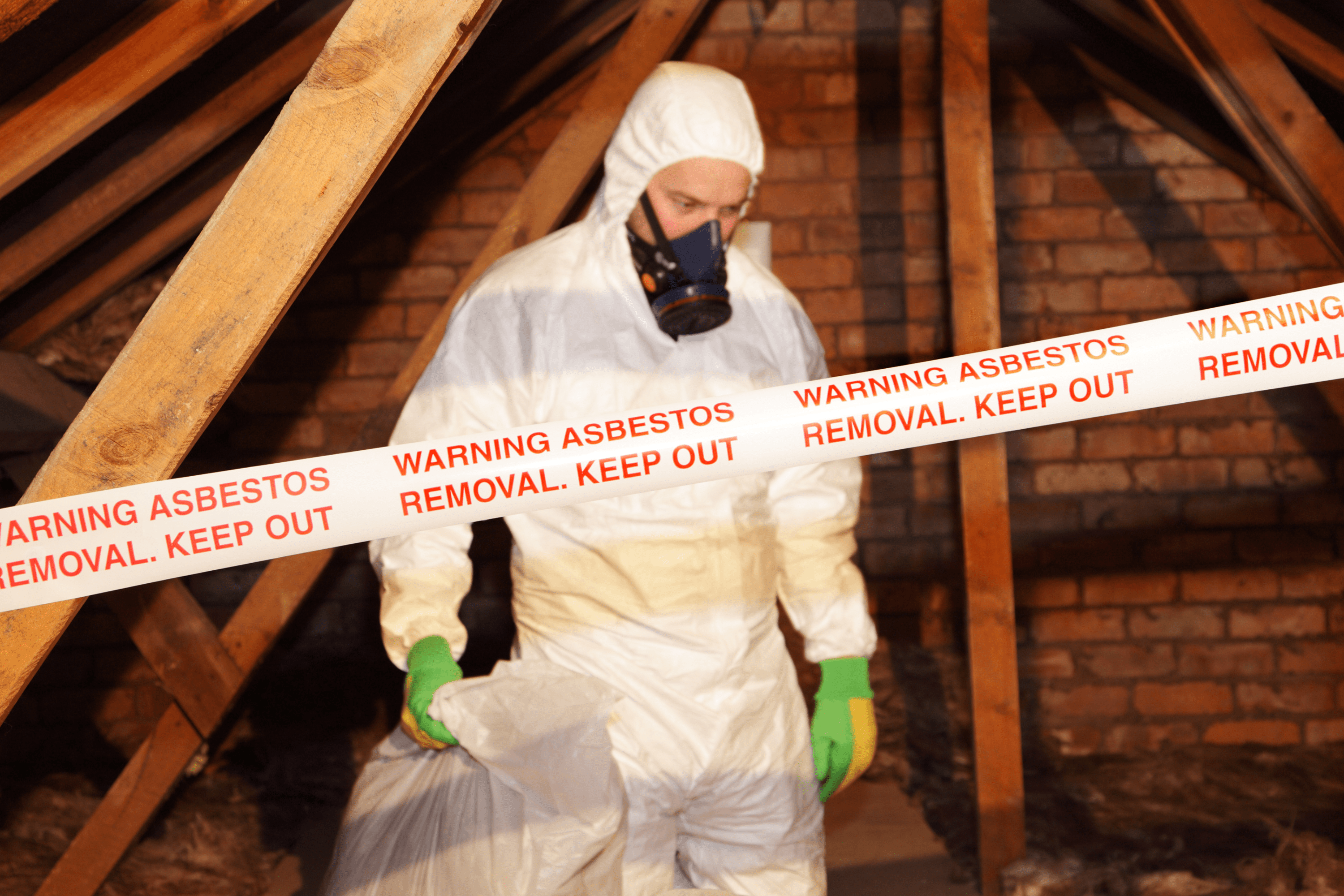 Professional asbestos removal expert on the job.